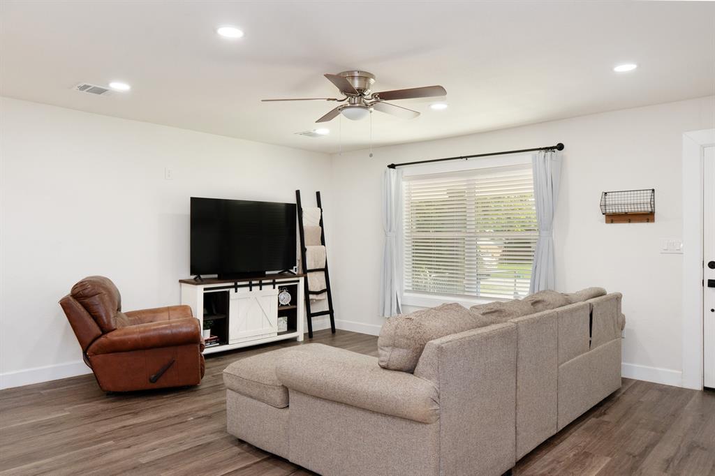 205 Oregon Avenue Azle, TX 76020 - Photo 8 of 40 Living area with recessed light and a ceiling fan