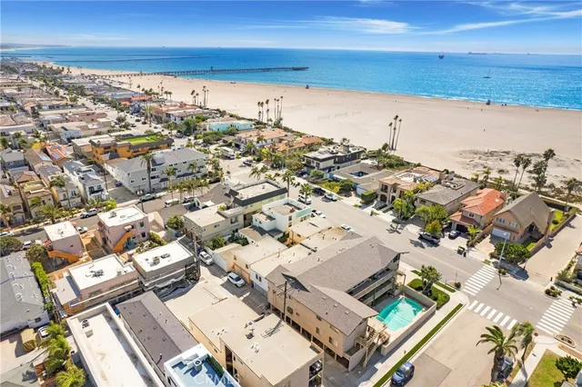 an aerial view of a ocean and beach