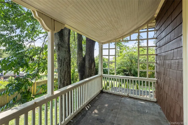 a view of a room with a large window