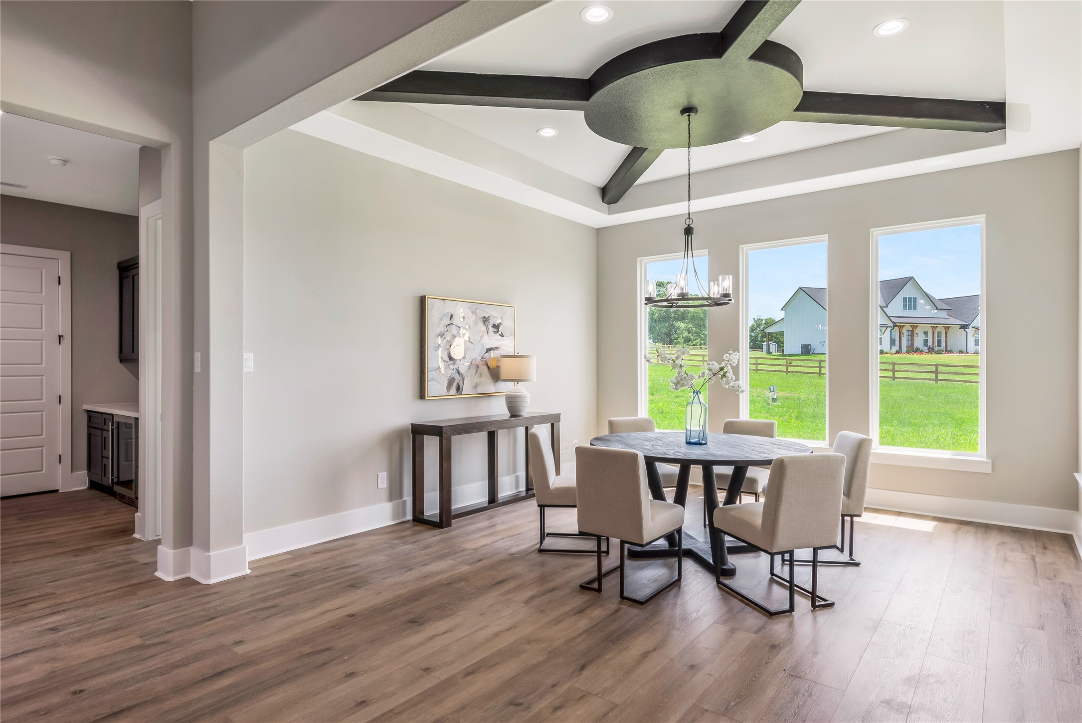 1483 Bluebonnet Ridge Drive Chappell Hill, TX 77426 - Photo 23 of 44 a view of a dining room with furniture window and wooden floor