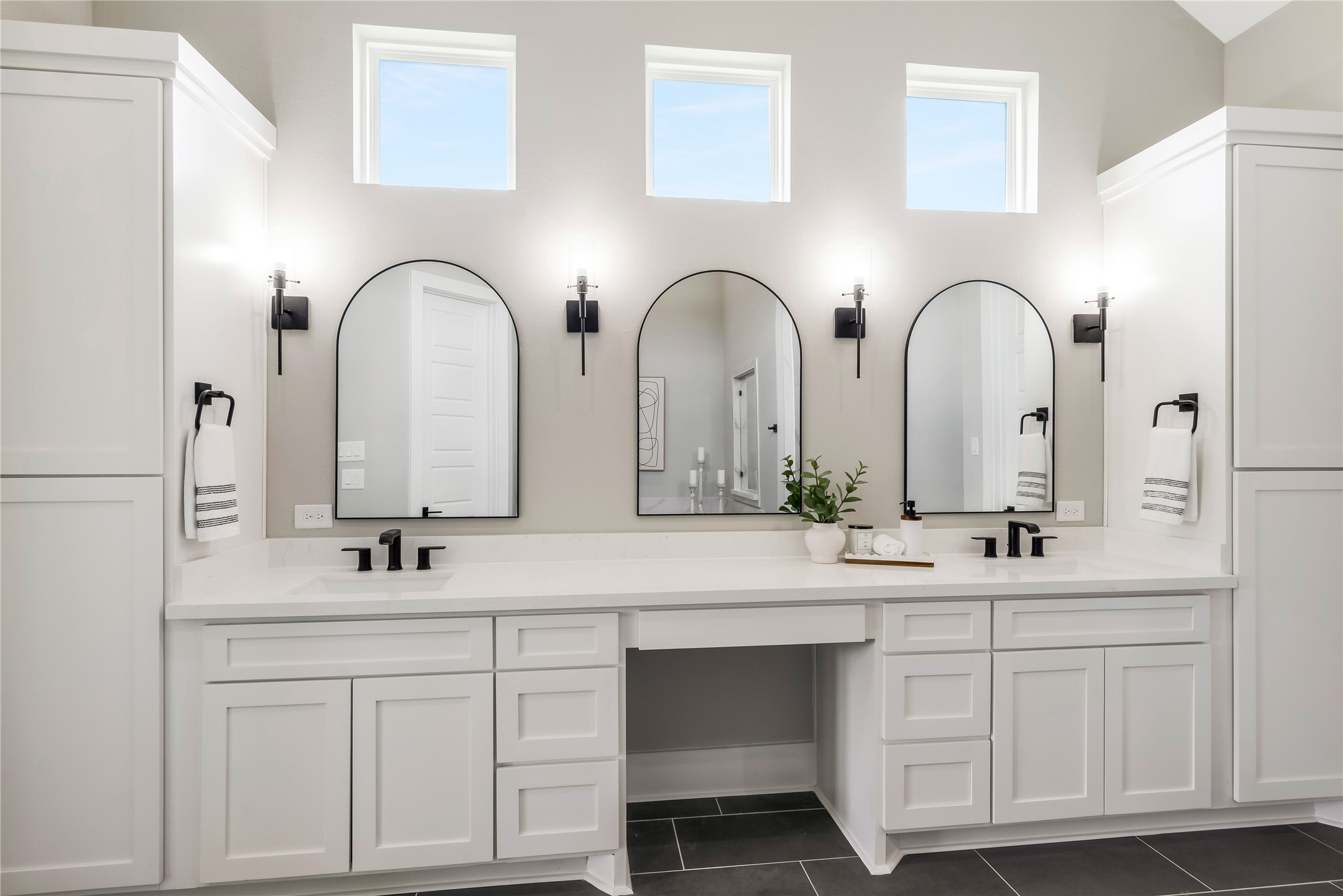 1483 Bluebonnet Ridge Drive Chappell Hill, TX 77426 - Photo 30 of 44 a bathroom with double vanity sinks and a mirror