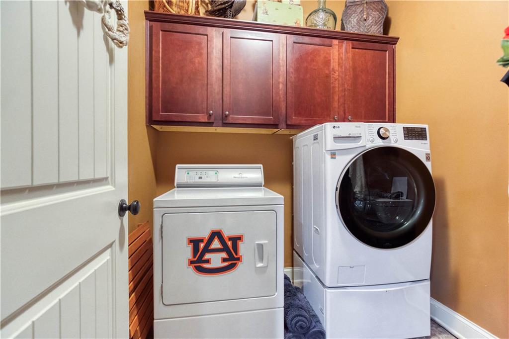 1461 Bradford Lane Monroe, GA 30656 - Photo 24 of 66 a utility room with dryer and washer