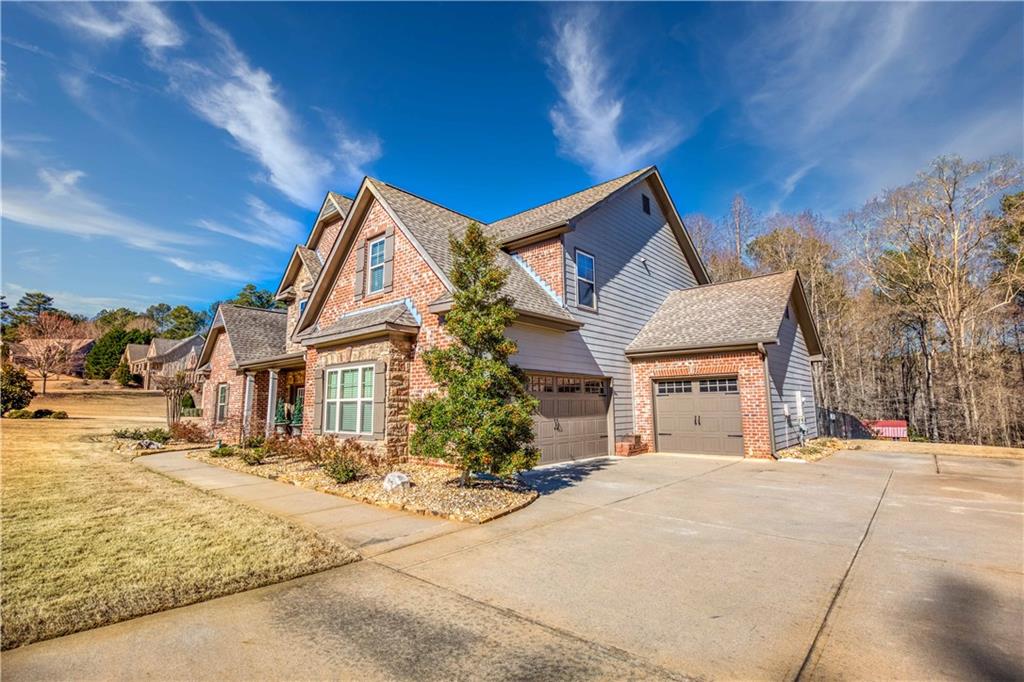1461 Bradford Lane Monroe, GA 30656 - Photo 3 of 66 a view of house with yard