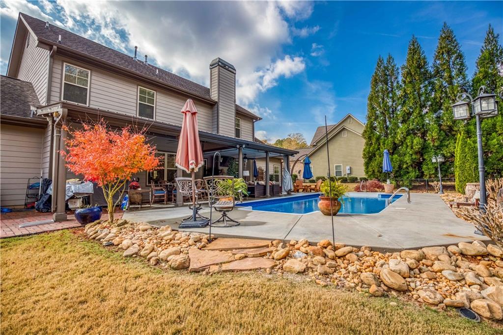 1461 Bradford Lane Monroe, GA 30656 - Photo 60 of 66 a building with trees in front of it