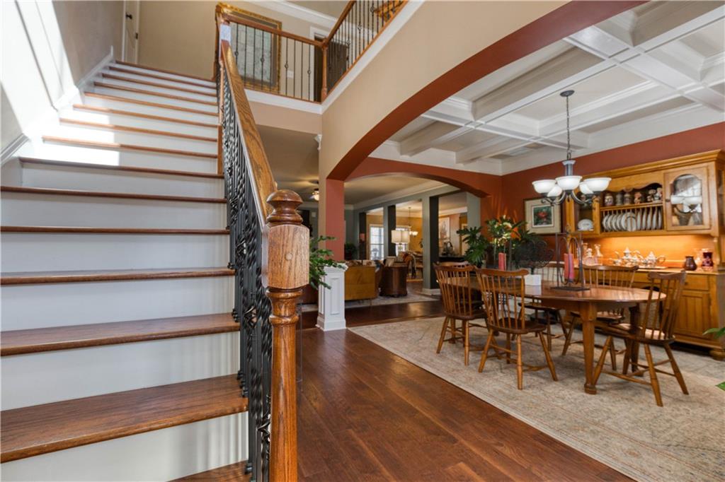 1461 Bradford Lane Monroe, GA 30656 - Photo 6 of 66 a view of entryway and hall with wooden floor