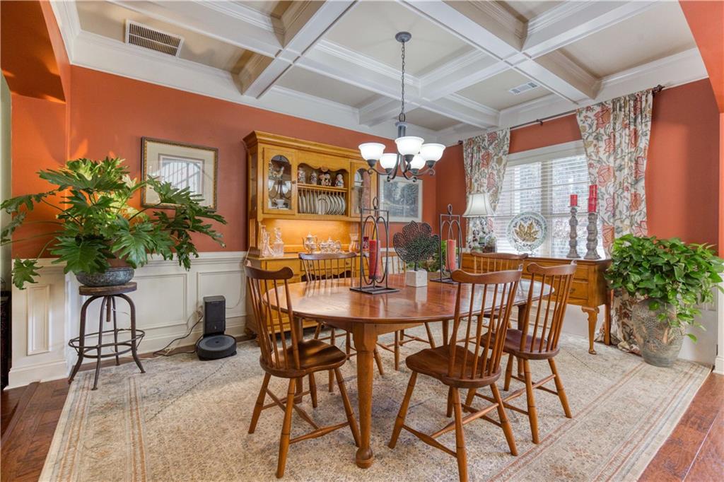 1461 Bradford Lane Monroe, GA 30656 - Photo 10 of 66 a dining room with furniture and chandelier