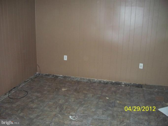 8052 Kimberly Road Dundalk, MD 21222 - Photo 5 of 6 a view of an empty room