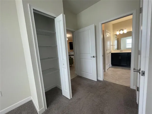 an entryway at a room with cabinet