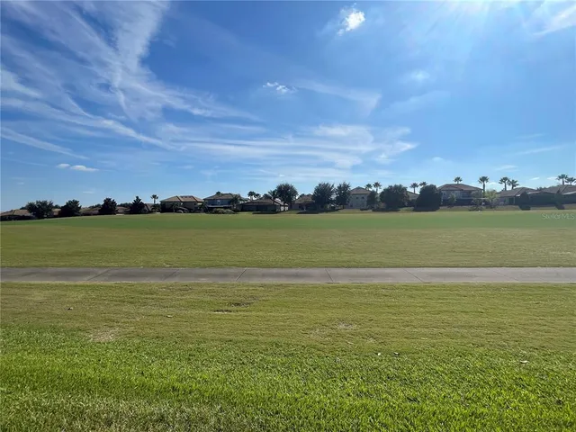 a view of a ocean with outside a house
