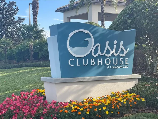 a view of sign board with yard