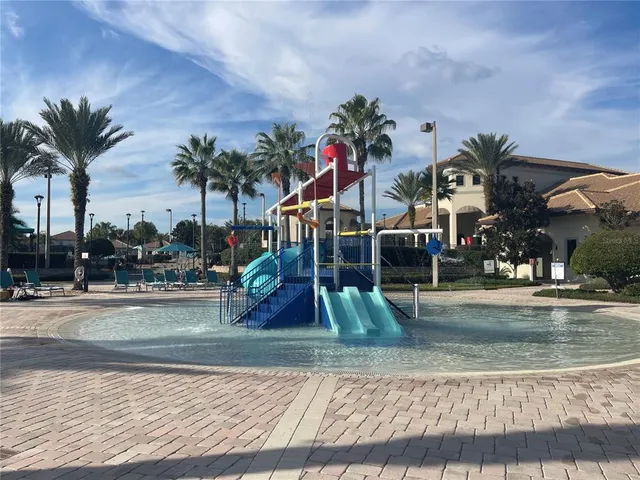a view of a park with swings