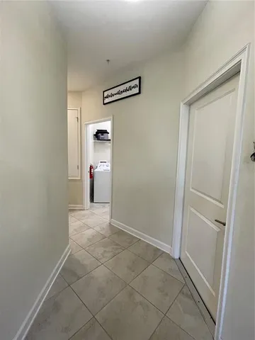 a view of a hallway to a room