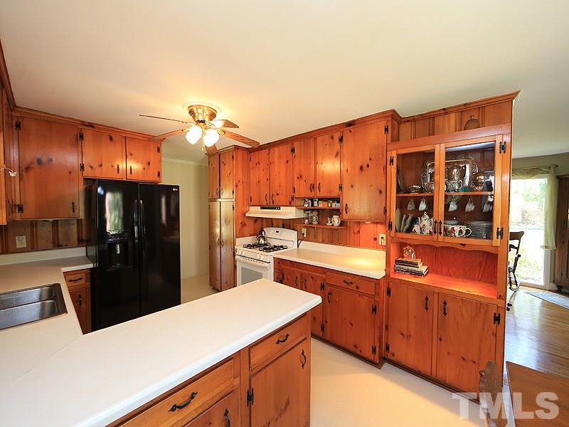 1616 Pineview Drive Raleigh, NC 27606 - Photo 11 of 18 Gas Stove, Closet Pantry, and built in hutch.