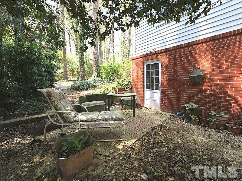 1616 Pineview Drive Raleigh, NC 27606 - Photo 3 of 18 Daylight basement offers over 1300 heated sq. ft. plus a large utility room. Large Bedroom, kitchen, spacious living room + full bath & Office/bonus rm with closet. Interior and exterior access.