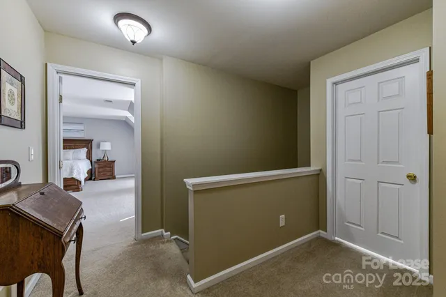 an empty room with mirror