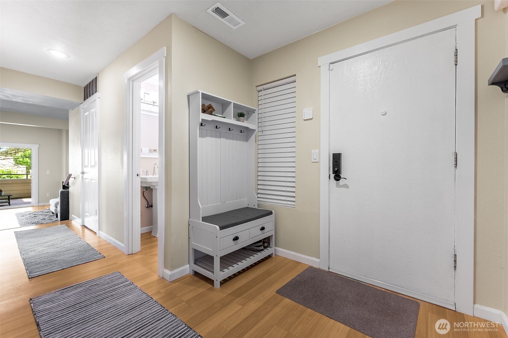 7331 Old Redmond Road, Unit 121 Redmond, WA 98052 - Photo 4 of 28 a view of a room with wooden floor and furniture
