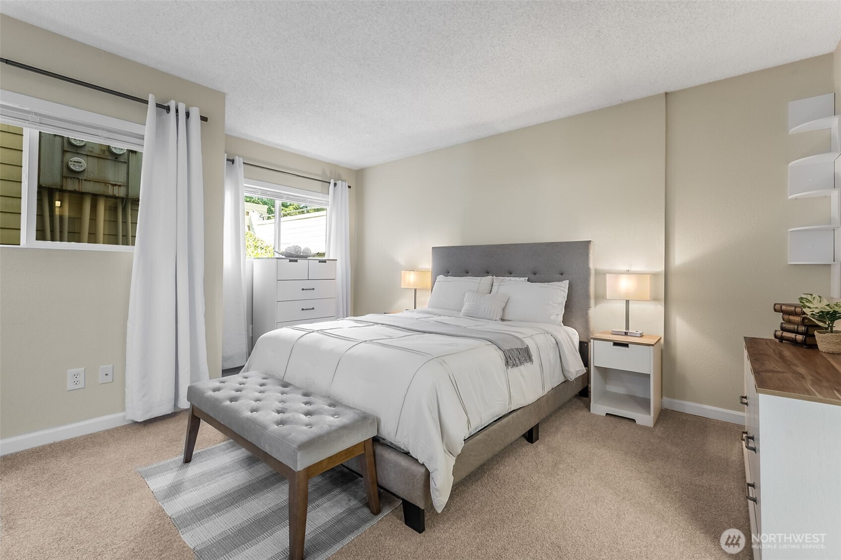 7331 Old Redmond Road, Unit 121 Redmond, WA 98052 - Photo 5 of 28 a bedroom with a bed and a table in it