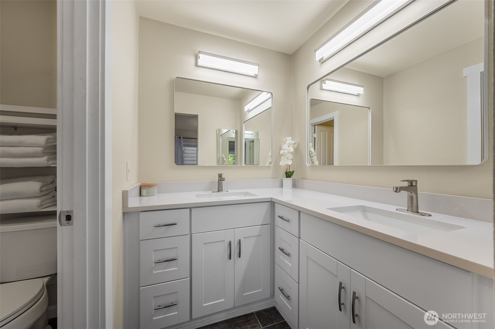 7331 Old Redmond Road, Unit 121 Redmond, WA 98052 - Photo 8 of 28 a spacious bathroom with a double vanity sink mirror and