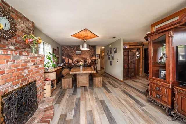 a view of a livingroom with furniture and entryway