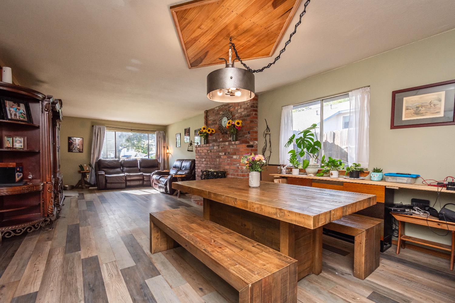 2266 River Trails Circle Rancho Cordova, CA 95670 - Photo 15 of 86 a view of a dining room with furniture window and wooden floor