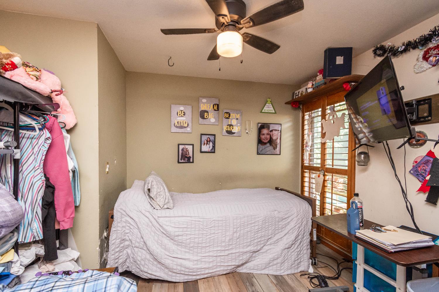 2266 River Trails Circle Rancho Cordova, CA 95670 - Photo 27 of 86 a bedroom with a bed a flat screen tv and a window