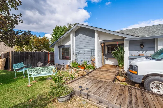 a front view of a house with patio