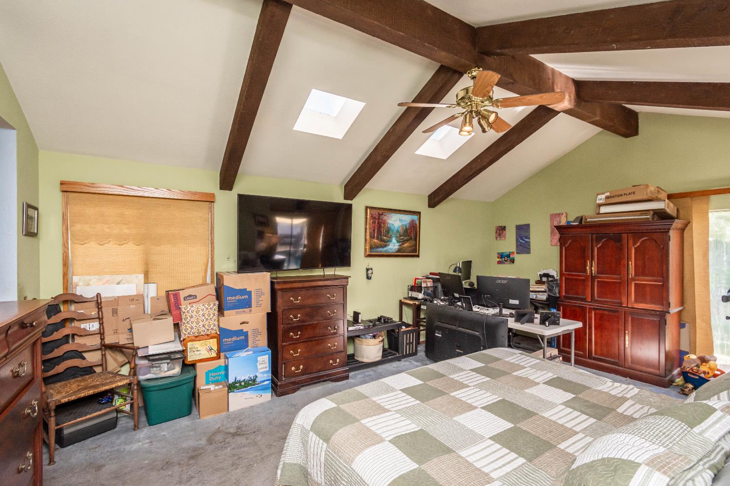 2266 River Trails Circle Rancho Cordova, CA 95670 - Photo 32 of 86 a bedroom with furniture a flat screen tv and a window