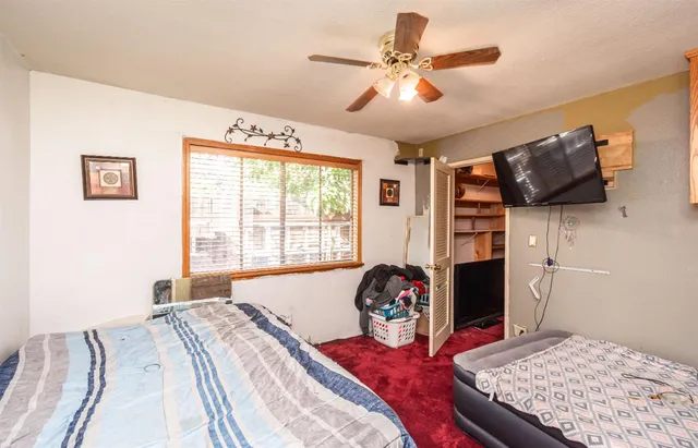 a view of a house with a yard porch and sitting area