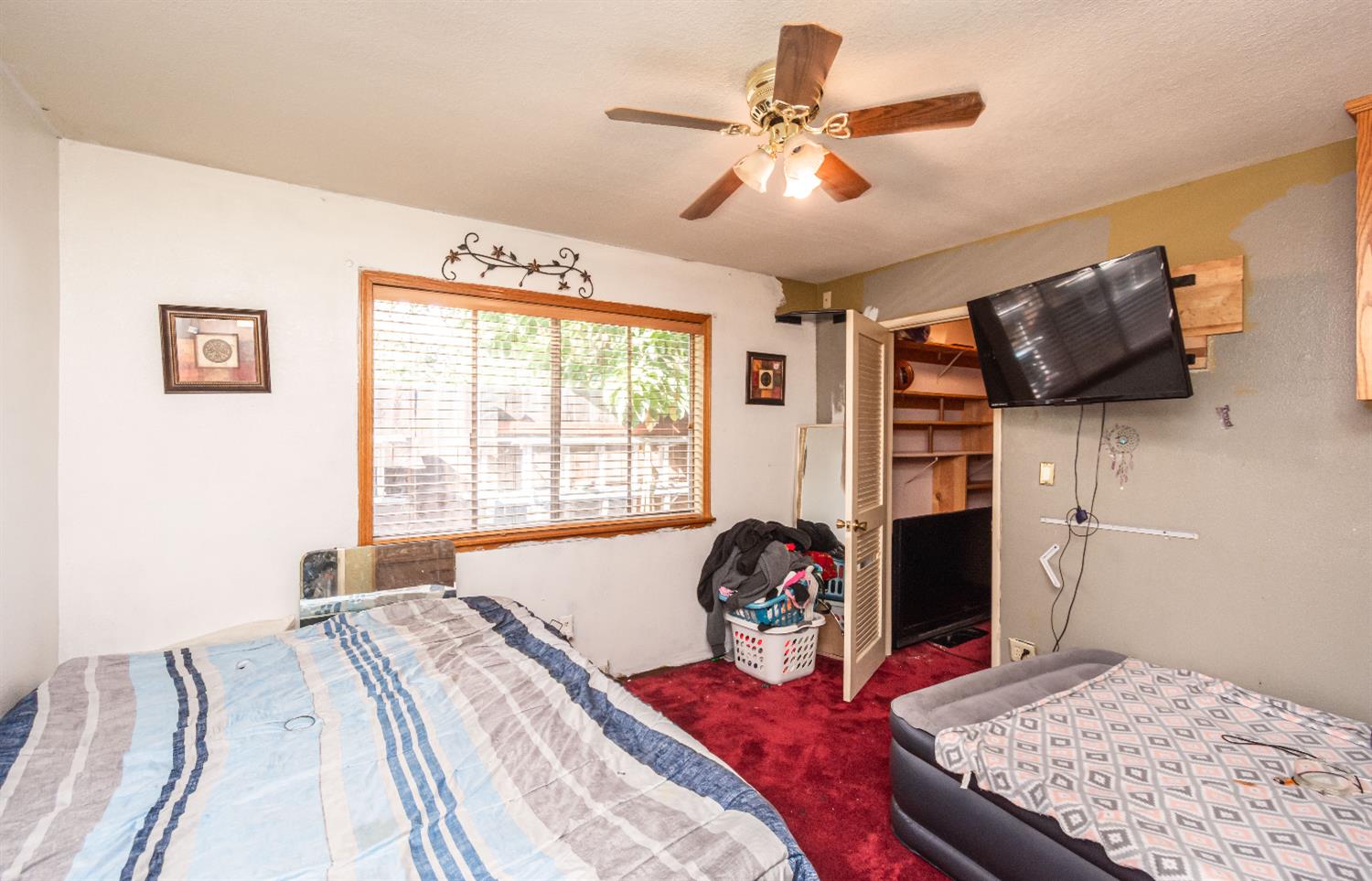 2266 River Trails Circle Rancho Cordova, CA 95670 - Photo 38 of 86 a bed sitting in a bedroom next to a window