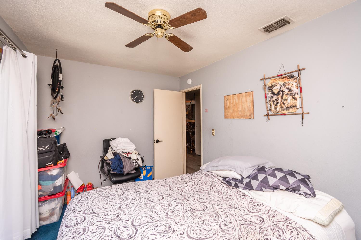 2266 River Trails Circle Rancho Cordova, CA 95670 - Photo 43 of 86 a bedroom that has a bed and a chair in it