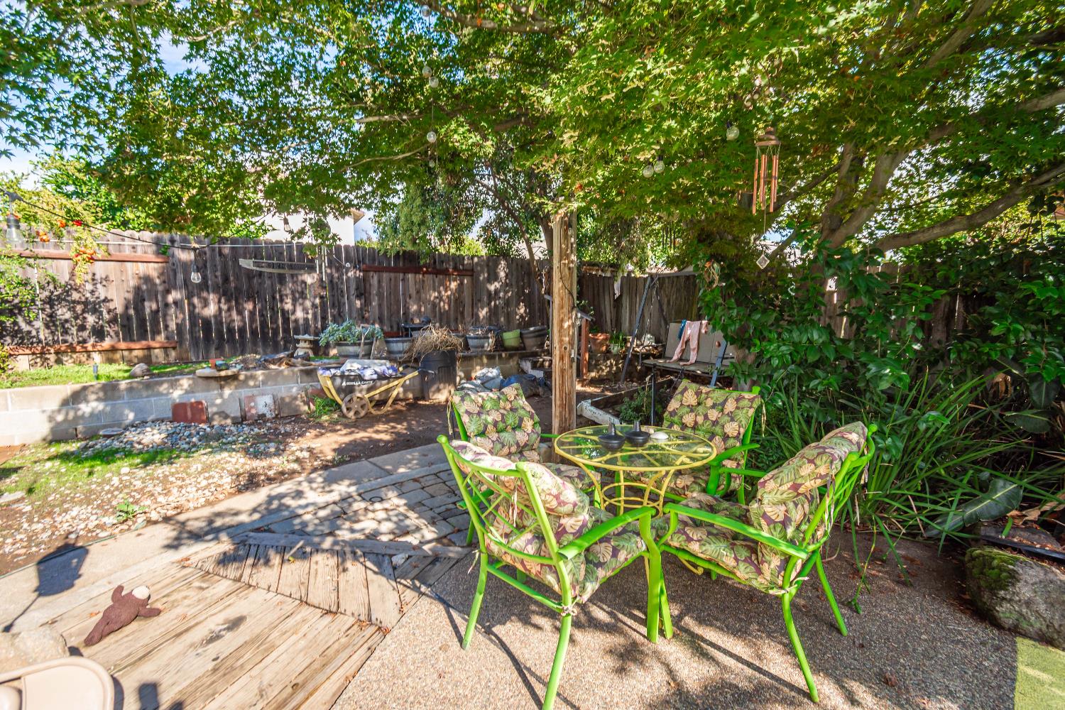 2266 River Trails Circle Rancho Cordova, CA 95670 - Photo 52 of 86 a view of patio with table and chairs and potted plants