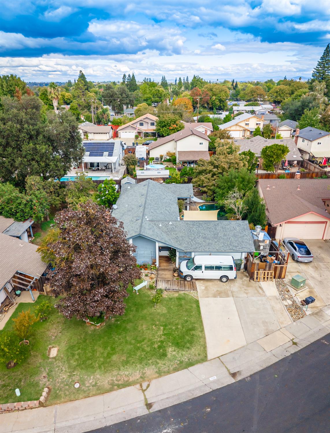 2266 River Trails Circle Rancho Cordova, CA 95670 - Photo 66 of 86 an aerial view of a house with a garden and lake view