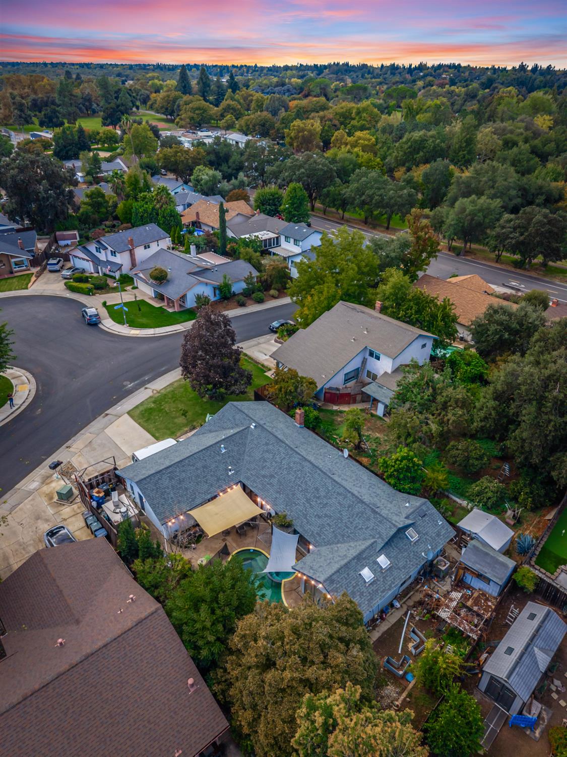 2266 River Trails Circle Rancho Cordova, CA 95670 - Photo 80 of 86 an aerial view of a city with lots of residential buildings and mountain view in back