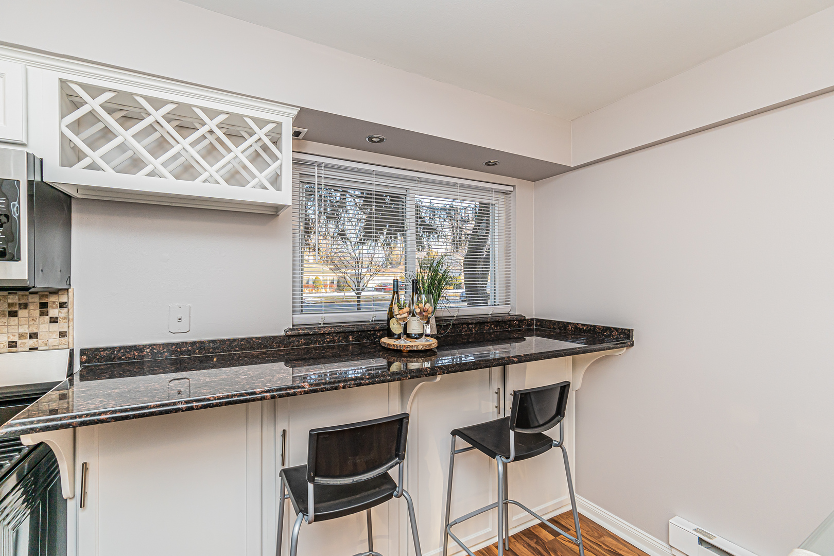 1480 Busse Road, Unit 1D Mount Prospect, IL 60056 - Photo 13 of 34 a kitchen with a sink and a window