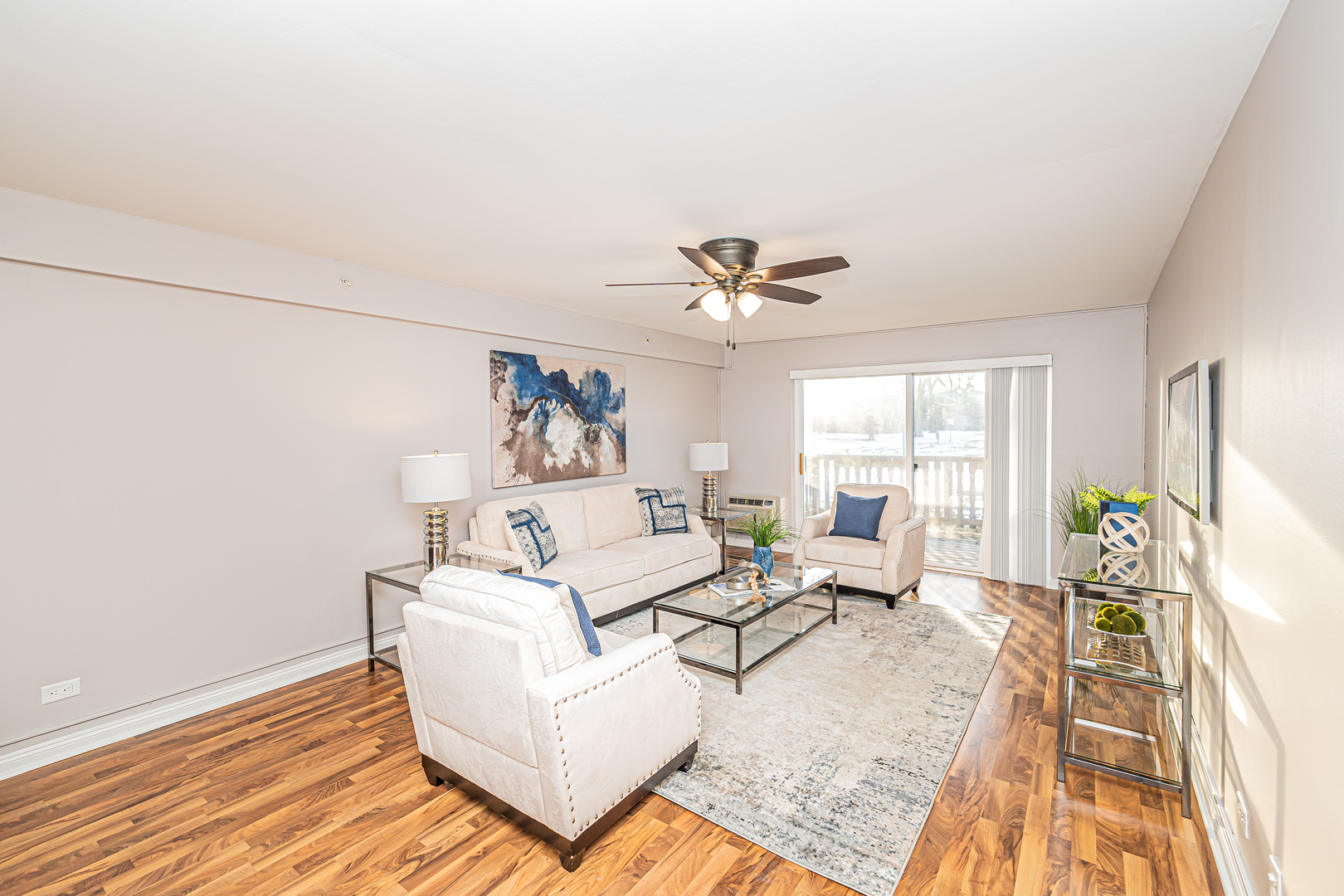 1480 Busse Road, Unit 1D Mount Prospect, IL 60056 - Photo 19 of 34 a living room with furniture and a large window