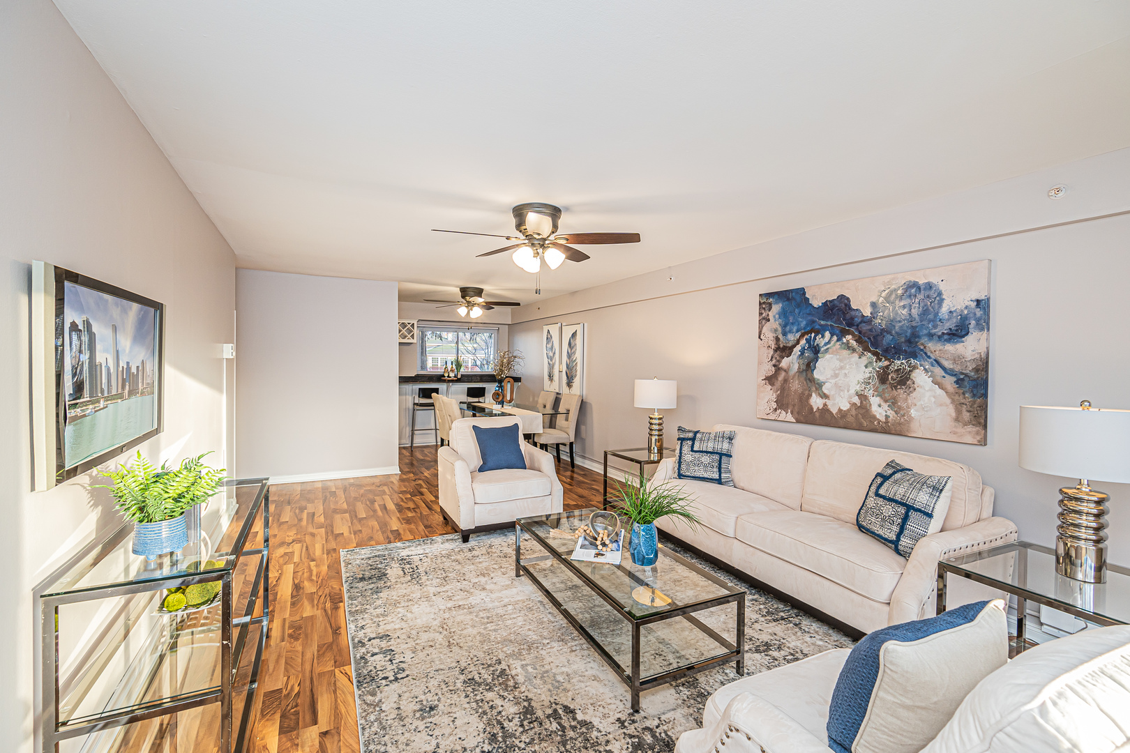 1480 Busse Road, Unit 1D Mount Prospect, IL 60056 - Photo 7 of 34 a living room with furniture and a chandelier