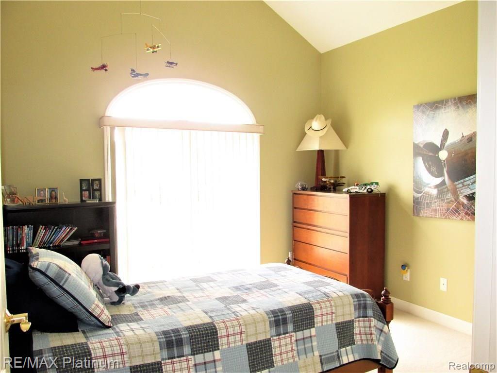 4290 Cahokia Ridge Linden, MI 48451 - Photo 38 of 49 ENTRY LEVEL BEDROOM #3 WITH CATHEDRAL CEILING
