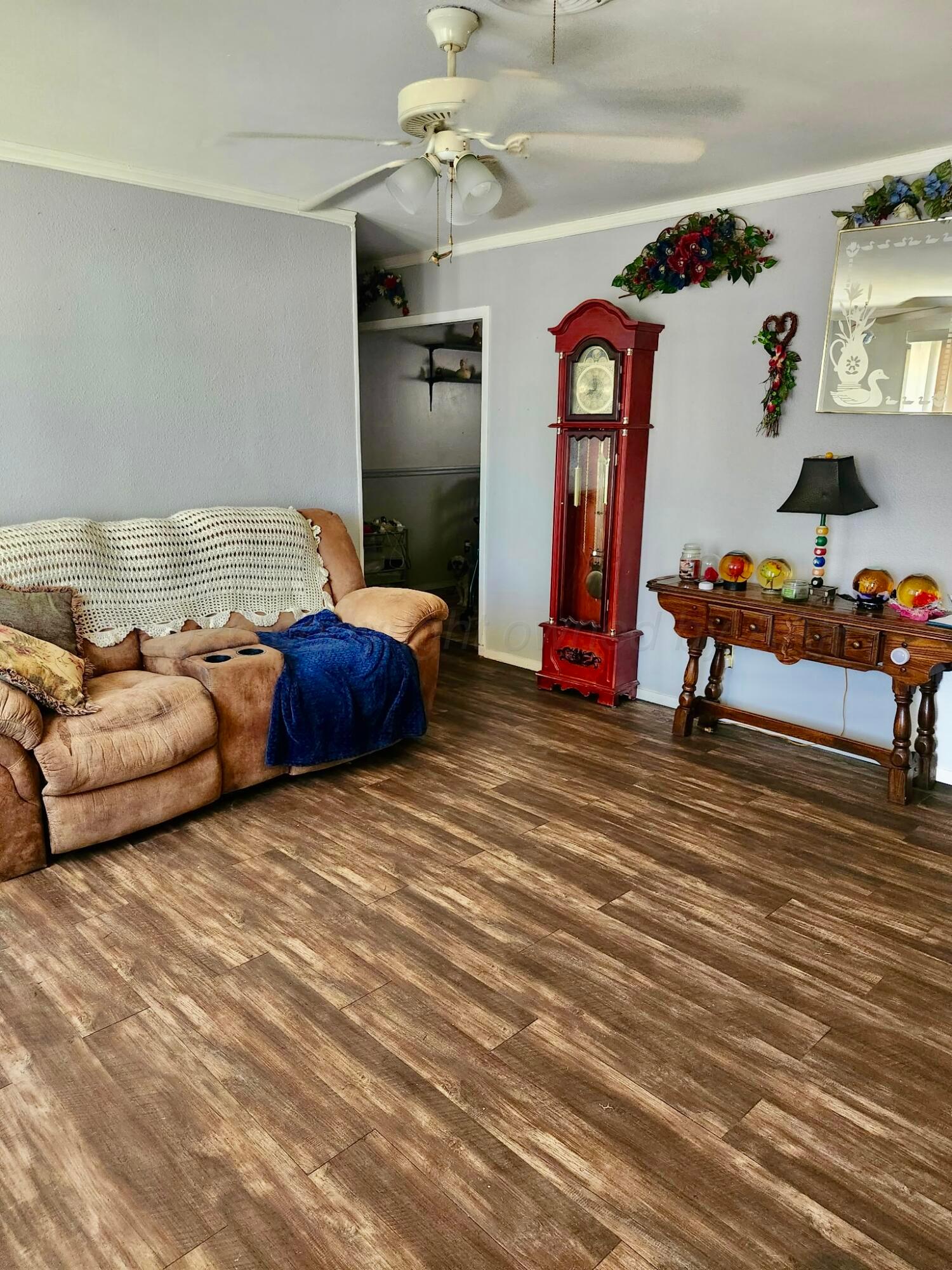 4404 South Fannin Street Amarillo, TX 79110 - Photo 2 of 13 a living room with furniture and a fireplace