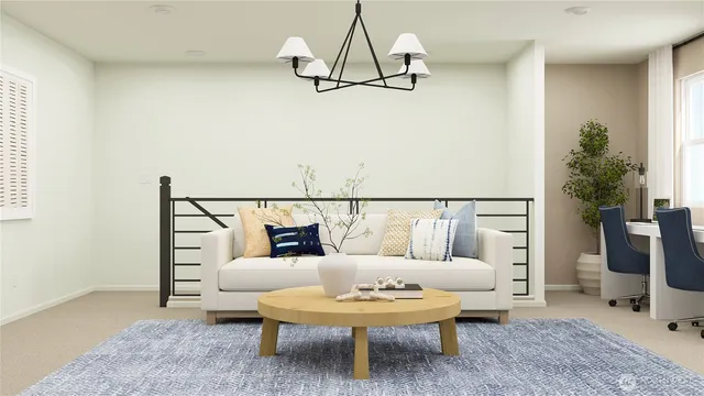 a living room with furniture and a chandelier