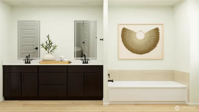 a bathroom with a bathtub and a sink