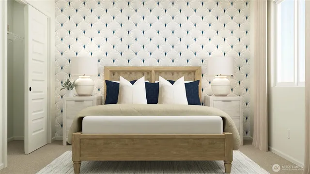 a bedroom with a bed and a lamp