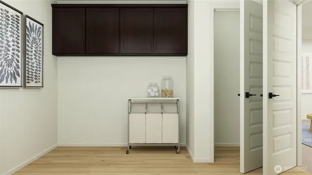 a view of a kitchen from the hallway