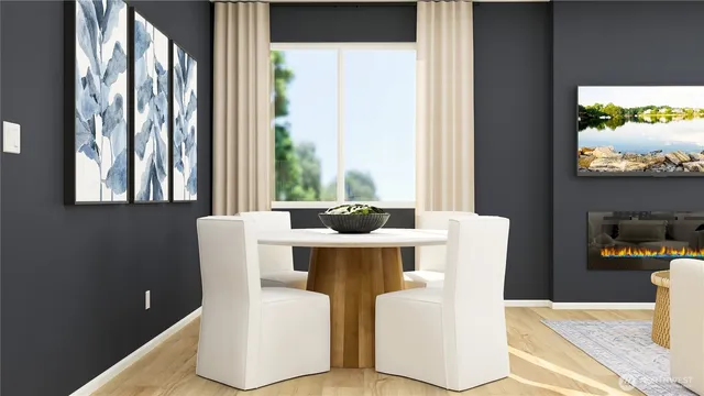 a dining table chair next to a window