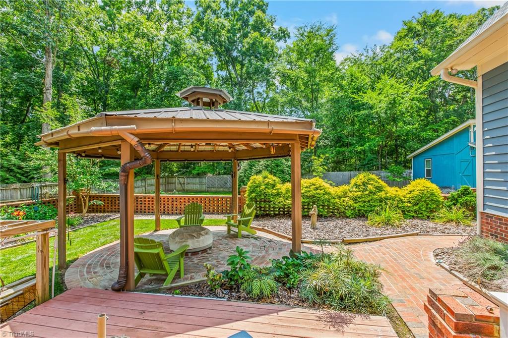 4112 St Johns Street High Point, NC 27265 - Photo 31 of 44 Custom patio and gazebo with fire pit