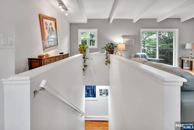 a view of living room with furniture and window