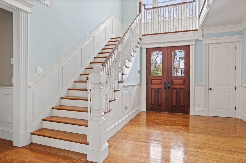 23 Burroughs Road Lexington, MA 02420 - Photo 2 of 27 a view of entryway and hall with wooden floor