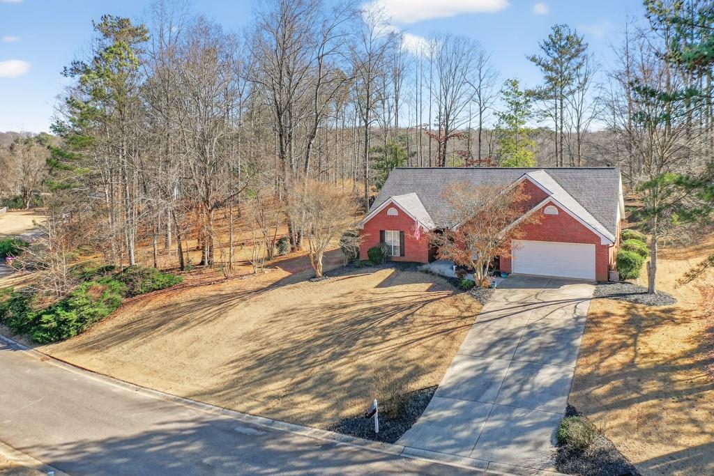 5926 Clipper Bay Flowery Branch, GA 30542 - Photo 1 of 1 a view of roof and wooden fence