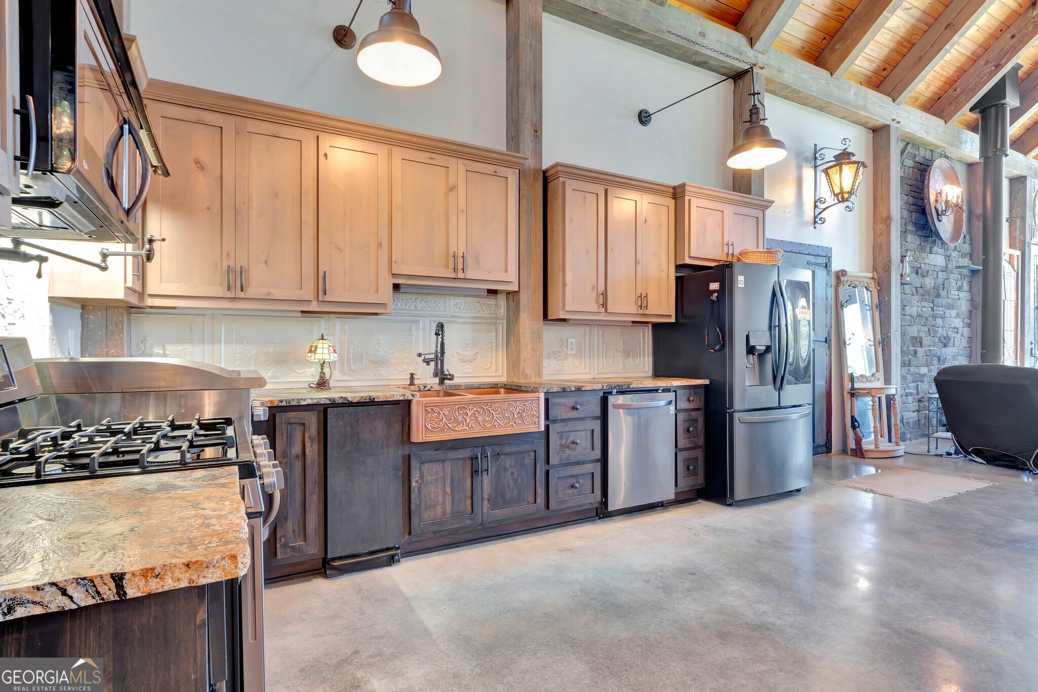 860 North Walker's Mill Road Griffin, GA 30223 - Photo 22 of 116 a kitchen with stainless steel appliances granite countertop a stove a sink dishwasher a refrigerator and cabinets with wooden floor
