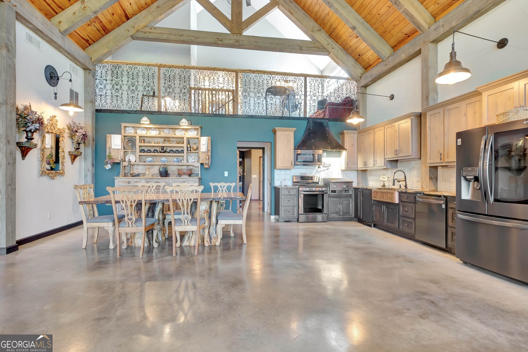 860 North Walker's Mill Road Griffin, GA 30223 - Photo 25 of 116 a kitchen with stainless steel appliances granite countertop a stove and a refrigerator