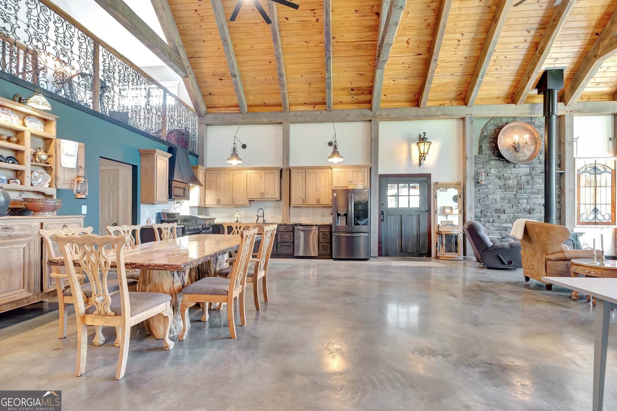 860 North Walker's Mill Road Griffin, GA 30223 - Photo 26 of 116 a view of a dining room with furniture and a chandelier